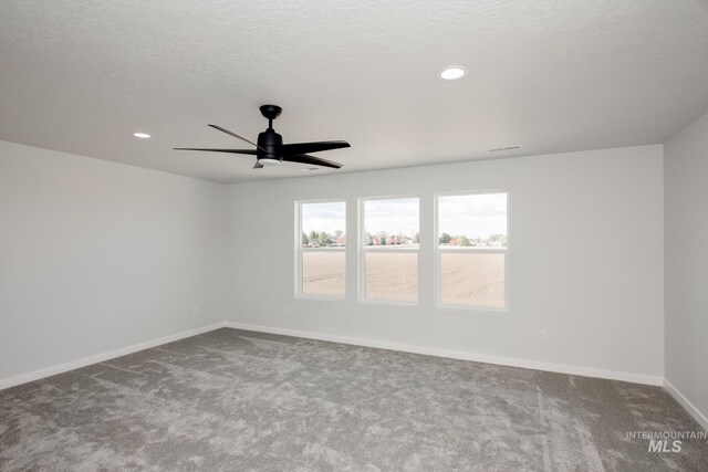 11075 W Windmill Way, Nampa, ID 83651 - carpeted spare room featuring a textured ceiling, ceiling fan, baseboards, and recessed lighting