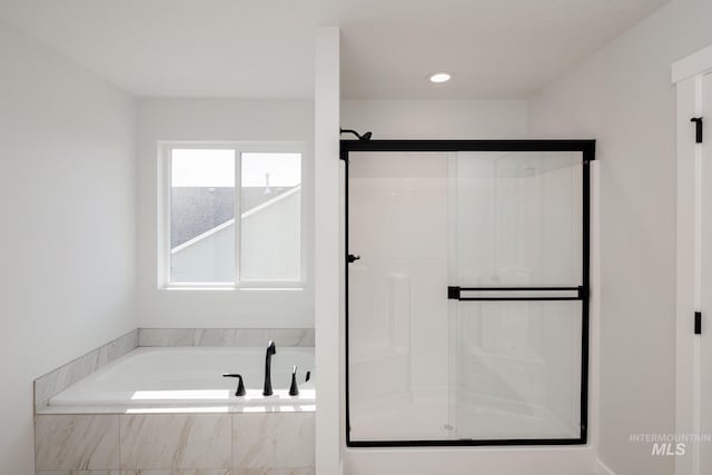 11075 W Windmill Way, Nampa, ID 83651 - full bathroom featuring a shower stall and a garden tub
