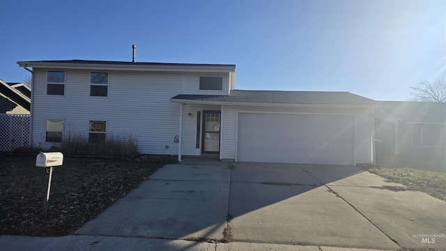 view of front of property featuring a garage