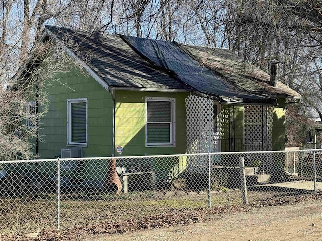 view of home's exterior featuring solar panels