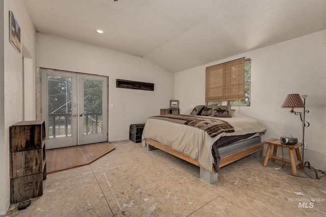 1507 Scheloske Rd, Weiser, ID 83672 - bedroom with french doors, access to exterior, lofted ceiling, and multiple windows