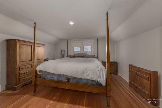 1507 Scheloske Rd, Weiser, ID 83672 - bedroom with lofted ceiling and wood finished floors
