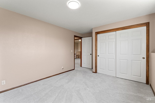 11185 W Humming Bird Dr, Boise, ID 83709 - unfurnished bedroom featuring light carpet and a closet