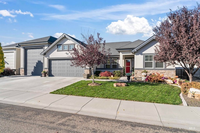 craftsman-style home with a front yard and a garage