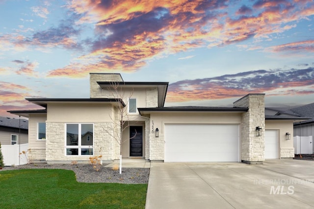 view of front of home featuring a garage