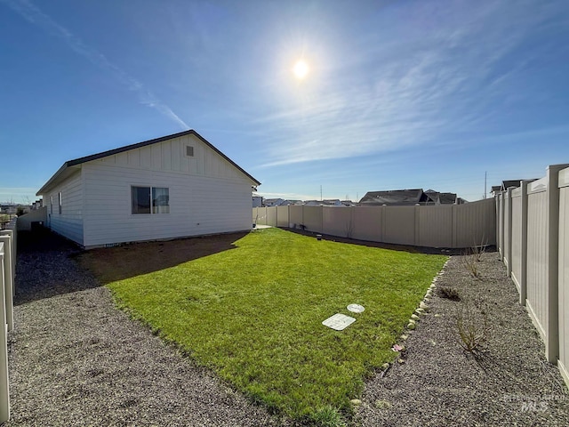 view of yard featuring a fenced backyard