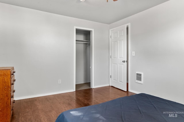 13771/2 Poplar, Clarkston, WA 99403 - bedroom featuring wood finished floors, heating unit, baseboards, and a closet