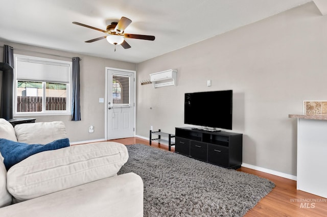 13771/2 Poplar, Clarkston, WA 99403 - living room featuring ceiling fan, baseboards, and wood finished floors