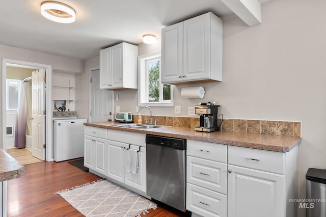 13771/2 Poplar, Clarkston, WA 99403 - kitchen with stainless steel dishwasher, washer / clothes dryer, a sink, wood finished floors, and white cabinets