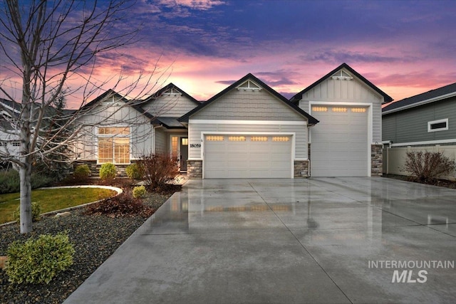 craftsman house with a garage