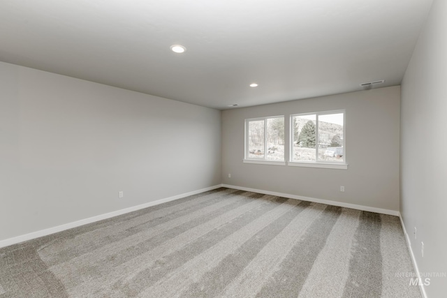 view of carpeted spare room