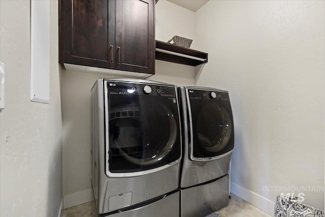 2033 E Whitetail St, Kuna, ID 83634 - laundry room with independent washer and dryer, cabinet space, and baseboards
