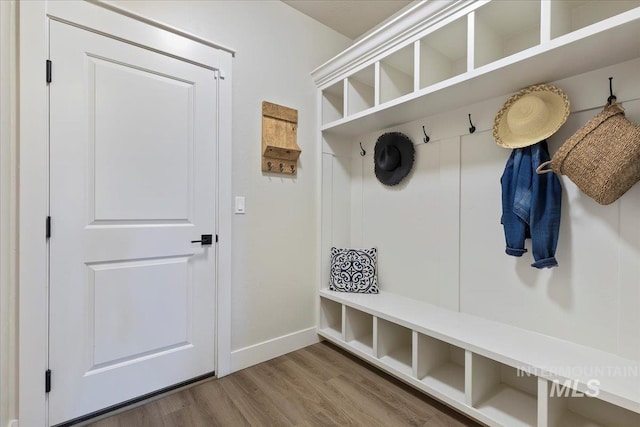 2033 E Whitetail St, Kuna, ID 83634 - mudroom featuring wood finished floors and baseboards