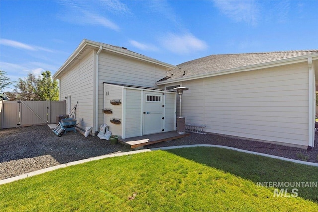 2033 E Whitetail St, Kuna, ID 83634 - rear view of house featuring a gate