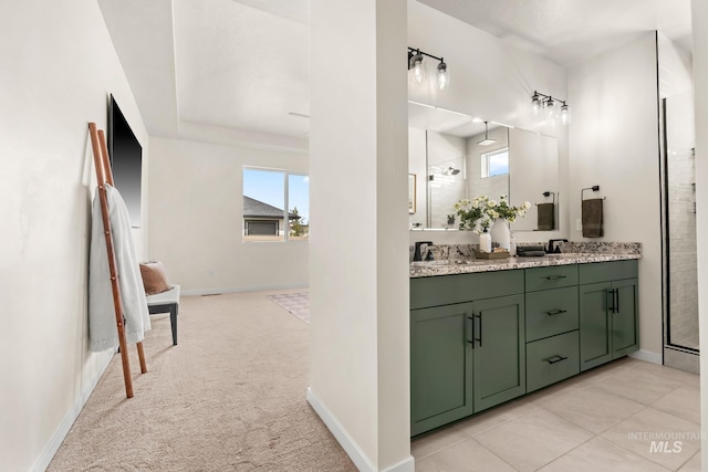 18293 N Begonia Way, Nampa, ID 83687 - bathroom with double vanity, a shower stall, and baseboards