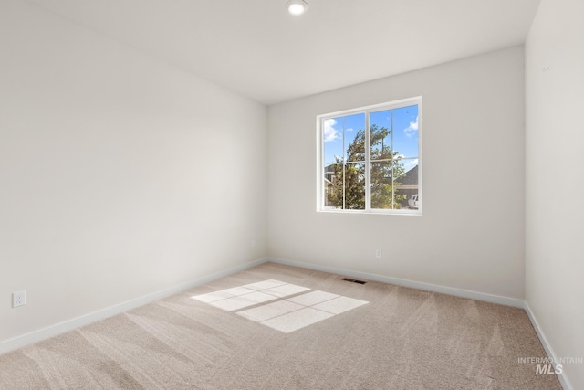 18293 N Begonia Way, Nampa, ID 83687 - empty room with carpet, baseboards, and recessed lighting