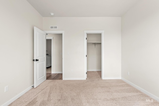 18293 N Begonia Way, Nampa, ID 83687 - unfurnished bedroom featuring carpet flooring, baseboards, and a spacious closet