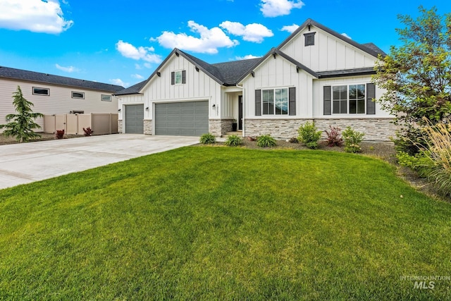 18293 N Begonia Way, Nampa, ID 83687 - modern inspired farmhouse featuring board and batten siding, driveway, stone siding, and an attached garage