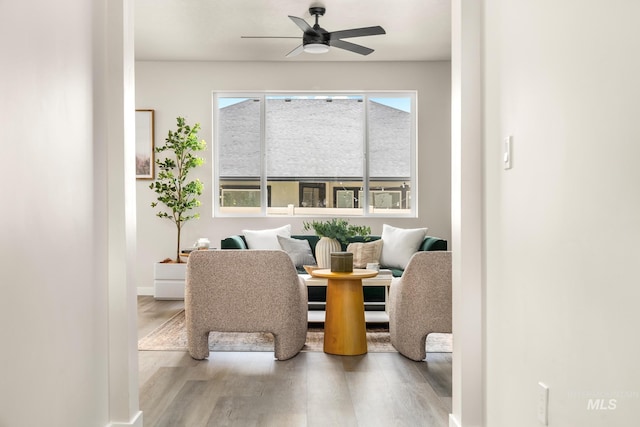 18293 N Begonia Way, Nampa, ID 83687 - dining room featuring wood finished floors, a ceiling fan, and baseboards