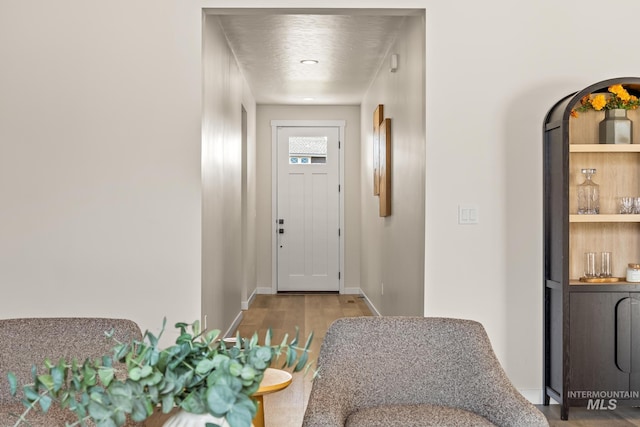 18293 N Begonia Way, Nampa, ID 83687 - foyer entrance with wood finished floors and baseboards