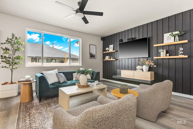 18293 N Begonia Way, Nampa, ID 83687 - living room with ceiling fan, wood finished floors, and baseboards
