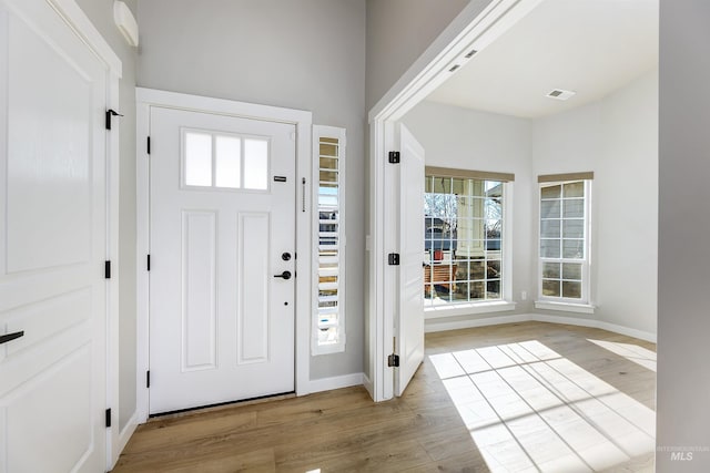 foyer entrance featuring light hardwood / wood-style floors