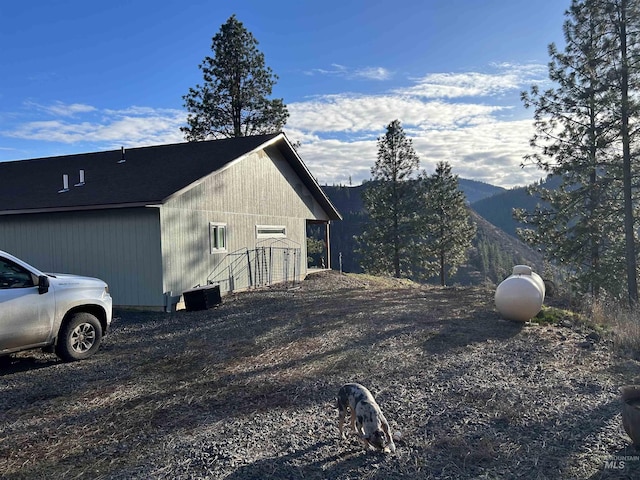 view of side of property featuring a mountain view