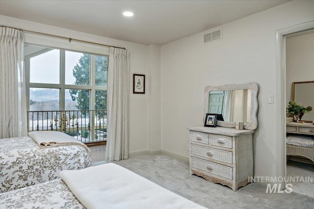 carpeted bedroom featuring recessed lighting, baseboards, and visible vents