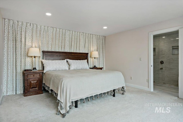 bedroom featuring baseboards, carpet floors, wallpapered walls, recessed lighting, and ensuite bathroom