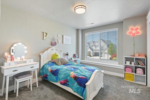 5988 N Lichfield Ave, Meridian, ID 83646 - carpeted bedroom featuring baseboards and a textured ceiling