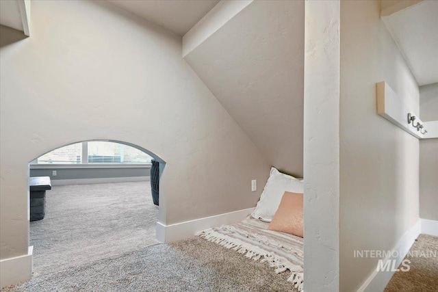 5988 N Lichfield Ave, Meridian, ID 83646 - stairway with arched walkways, baseboards, and carpet