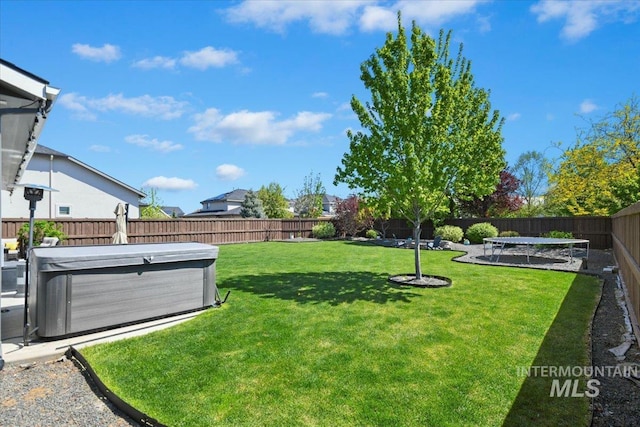 5988 N Lichfield Ave, Meridian, ID 83646 - view of yard with a fenced backyard and a hot tub