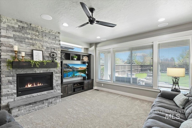 5988 N Lichfield Ave, Meridian, ID 83646 - living area featuring baseboards, a ceiling fan, a textured ceiling, and carpet floors