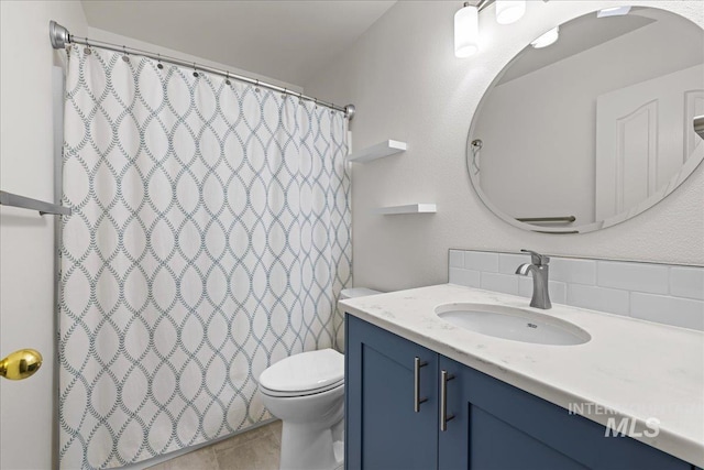 1400 W Florida Ave, Nampa, ID 83686 - full bath with vanity, toilet, decorative backsplash, and a shower with shower curtain