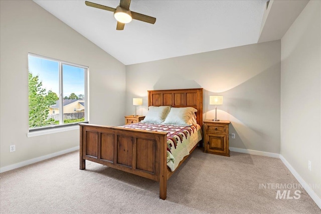 1400 W Florida Ave, Nampa, ID 83686 - bedroom featuring vaulted ceiling, light colored carpet, baseboards, and ceiling fan