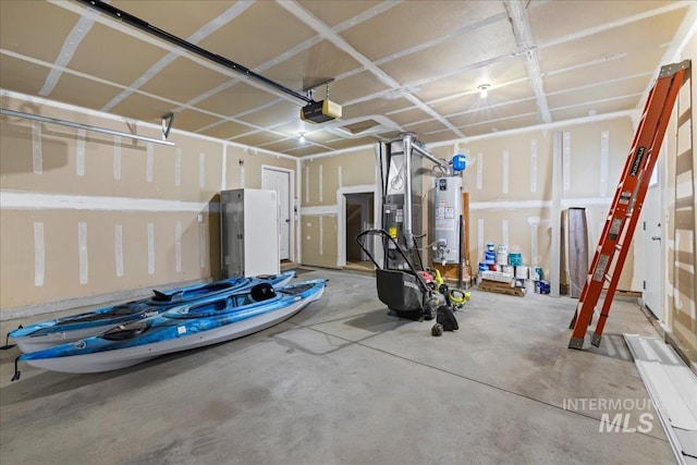 1400 W Florida Ave, Nampa, ID 83686 - garage featuring water heater and a garage door opener