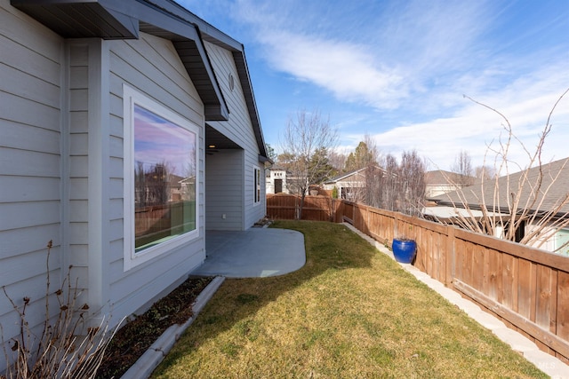 view of yard featuring a fenced backyard