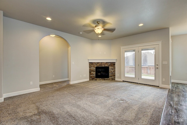 unfurnished living room with recessed lighting, baseboards, and a ceiling fan