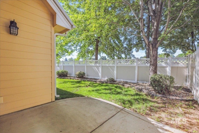 633 S Archstone Way, Boise, ID 83709 - fenced backyard featuring a patio area