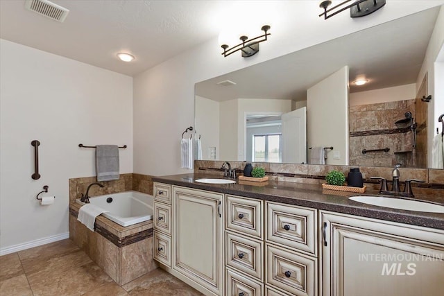 bathroom featuring plus walk in shower and vanity