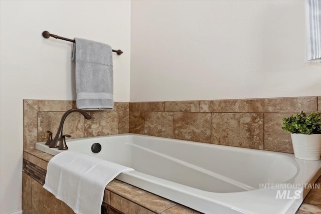 bathroom with a bathing tub