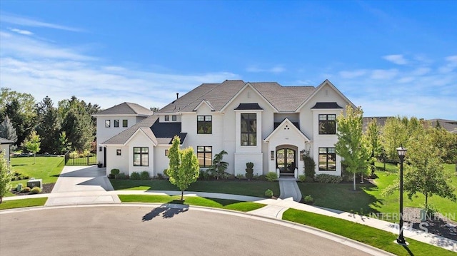 965 S Ranch House Way, Eagle, ID 83616 - french country style house featuring concrete driveway and stucco siding