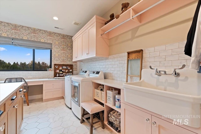 965 S Ranch House Way, Eagle, ID 83616 - clothes washing area featuring washing machine and dryer, cabinet space, wallpapered walls, recessed lighting, and light tile patterned floors