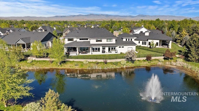 965 S Ranch House Way, Eagle, ID 83616 - rear view of property featuring a water and mountain view and a residential view