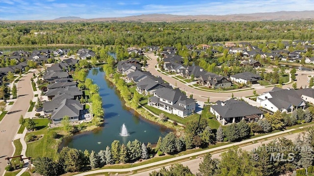 965 S Ranch House Way, Eagle, ID 83616 - aerial view of residential area with a forest and a large body of water