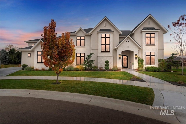 965 S Ranch House Way, Eagle, ID 83616 - view of front facade with a lawn and stucco siding