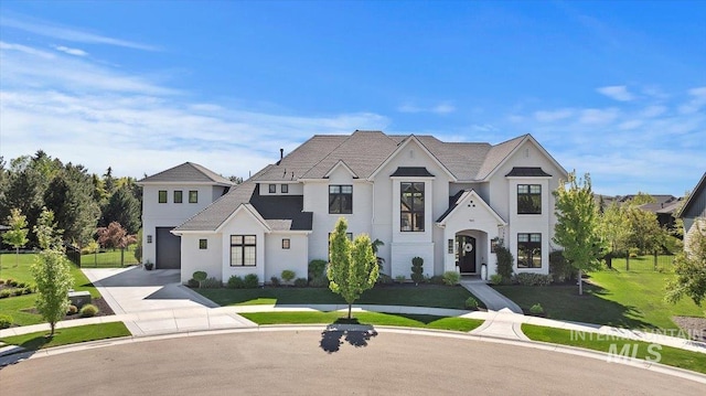 965 S Ranch House Way, Eagle, ID 83616 - french provincial home featuring driveway, a front lawn, stucco siding, and an attached garage