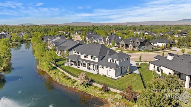 965 S Ranch House Way, Eagle, ID 83616 - aerial overview of property's location featuring nearby suburban area and a water and mountain view