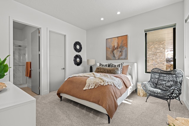 bedroom featuring recessed lighting and light carpet