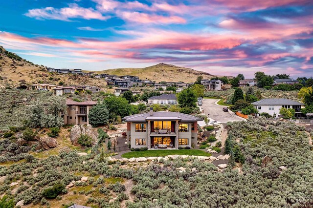 back of property with a mountain view